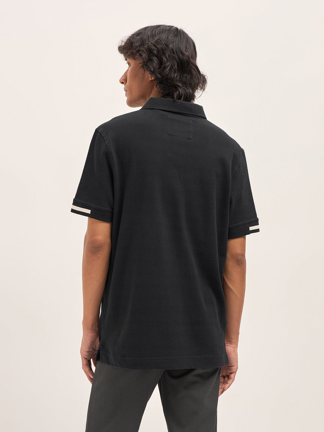 Black Slim Fit Polo with Textured Flat Knit Design by The Bear House